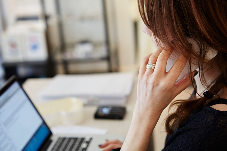 Woman with a phone to her ear